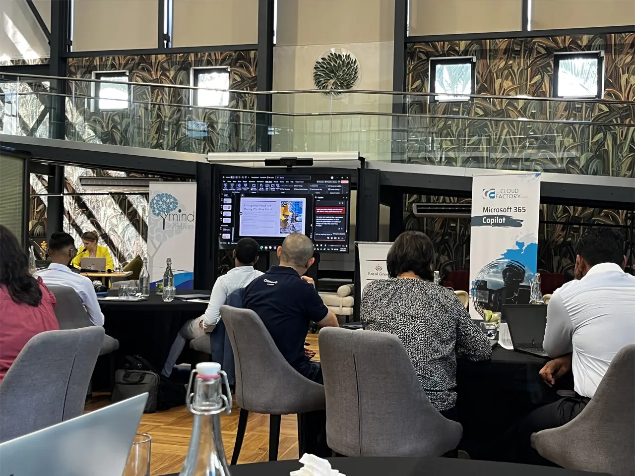 People attending a business presentation at conference.