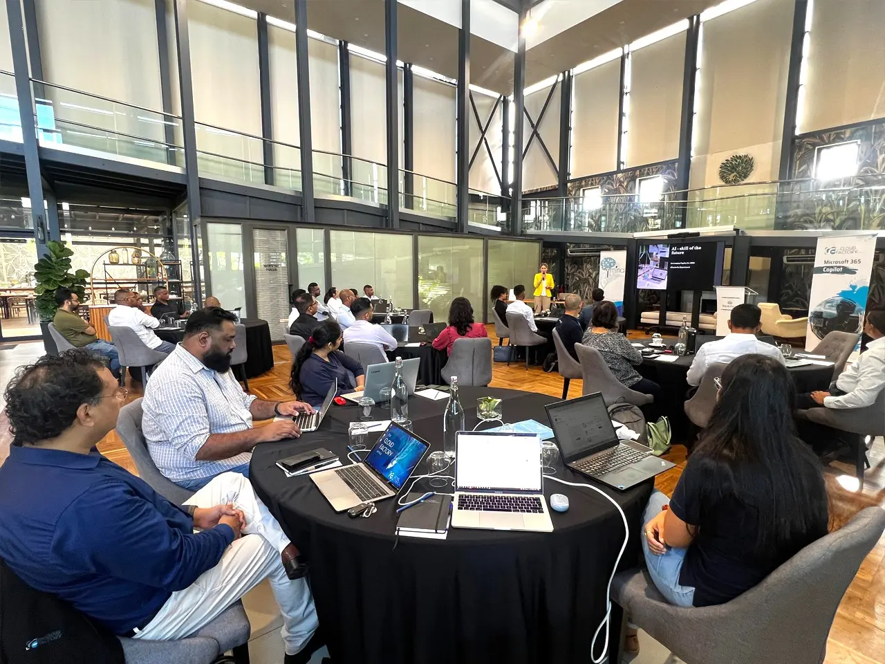 People attending a business presentation in office.