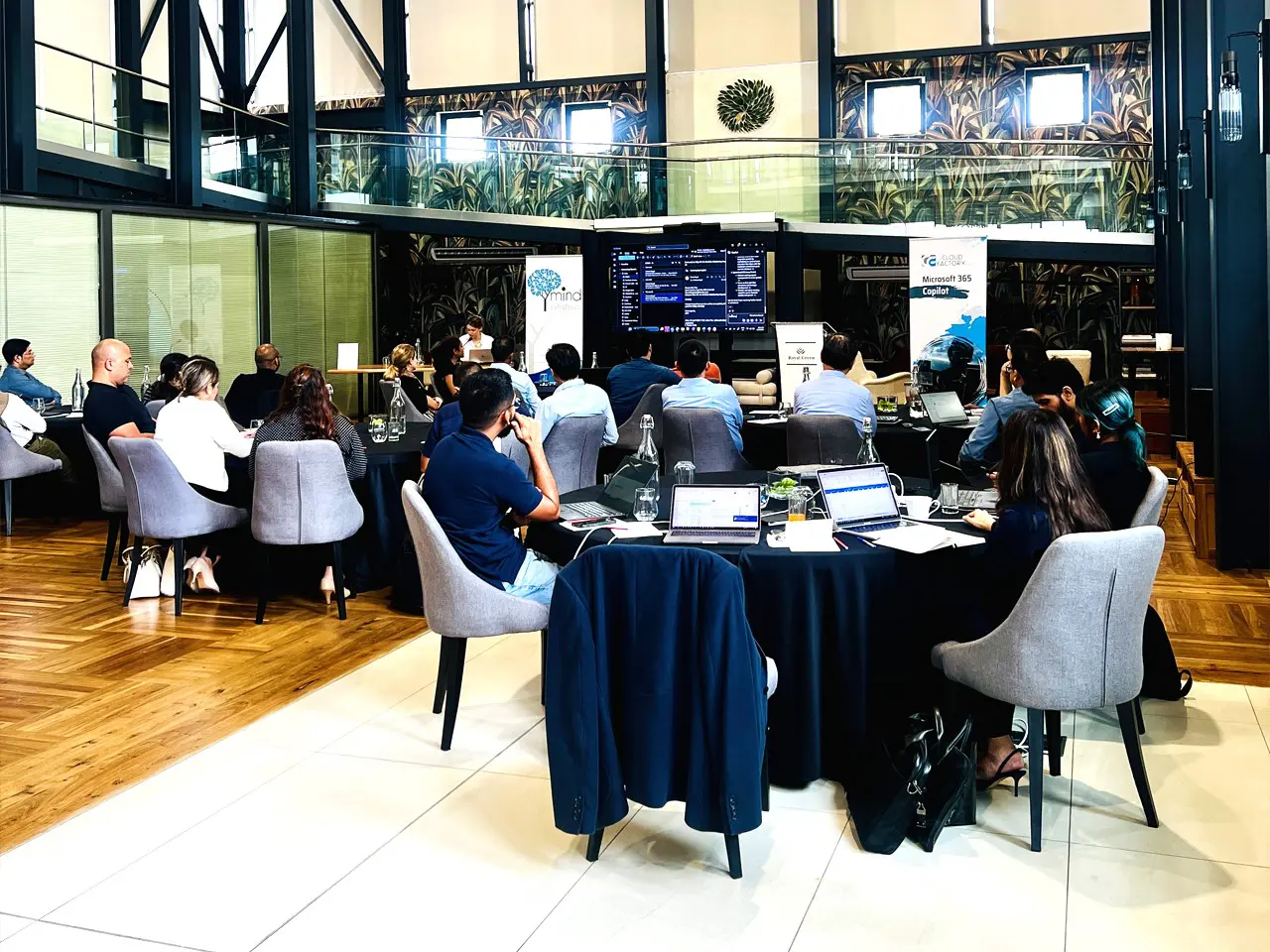 People attending a business meeting in conference room.