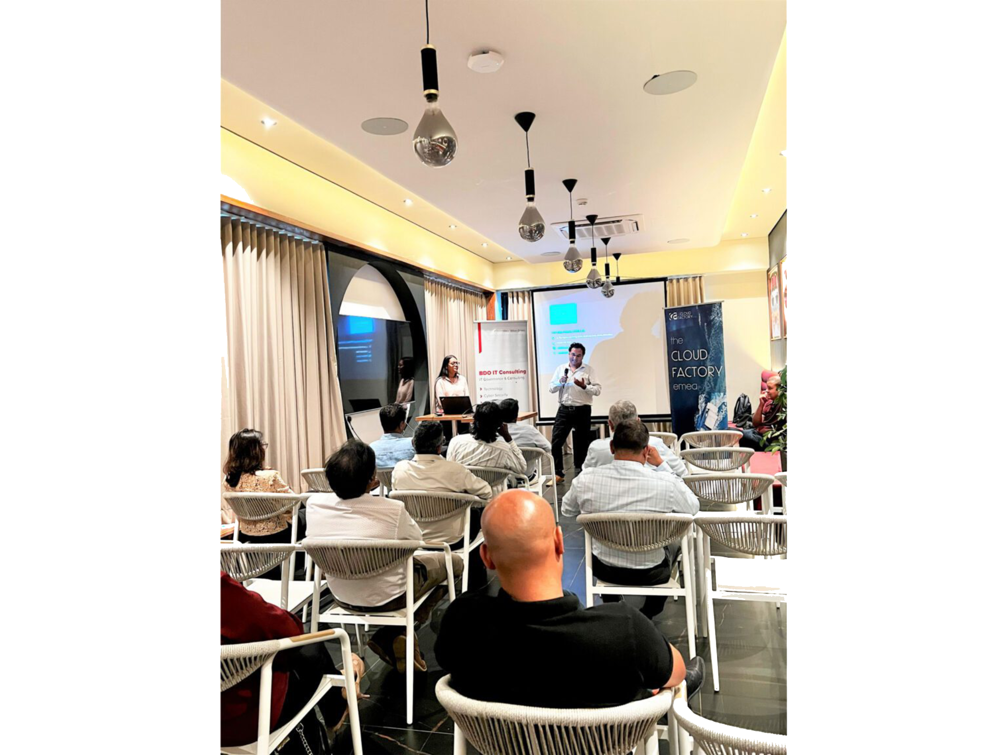 Presentation in a modern conference room setting.