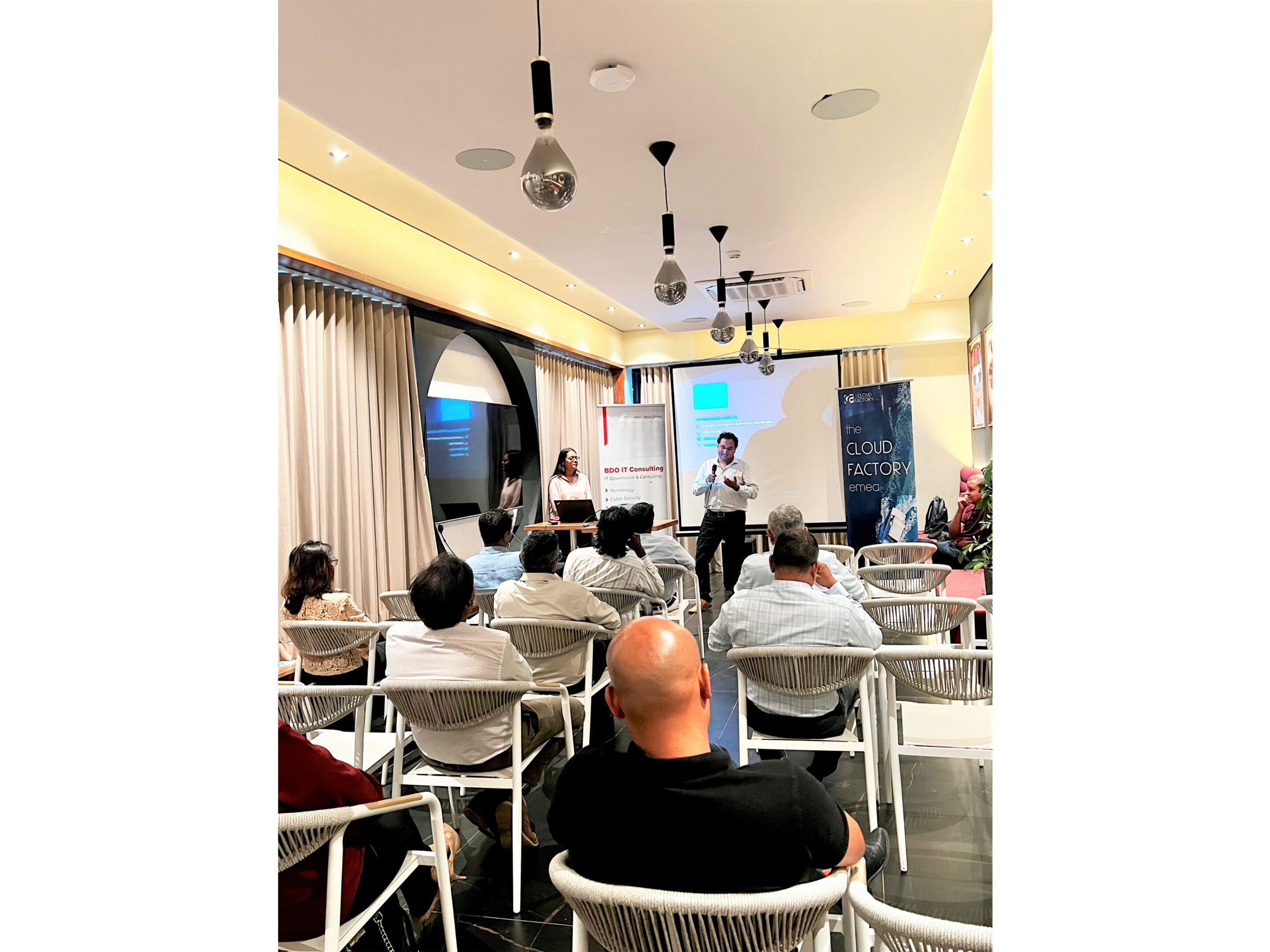 Presentation in a modern conference room setting.