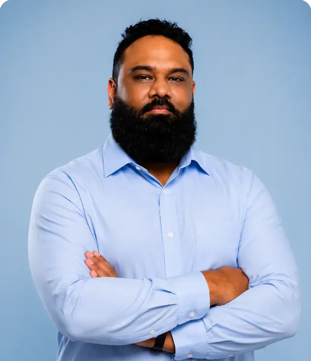 Bearded man posing confidently
